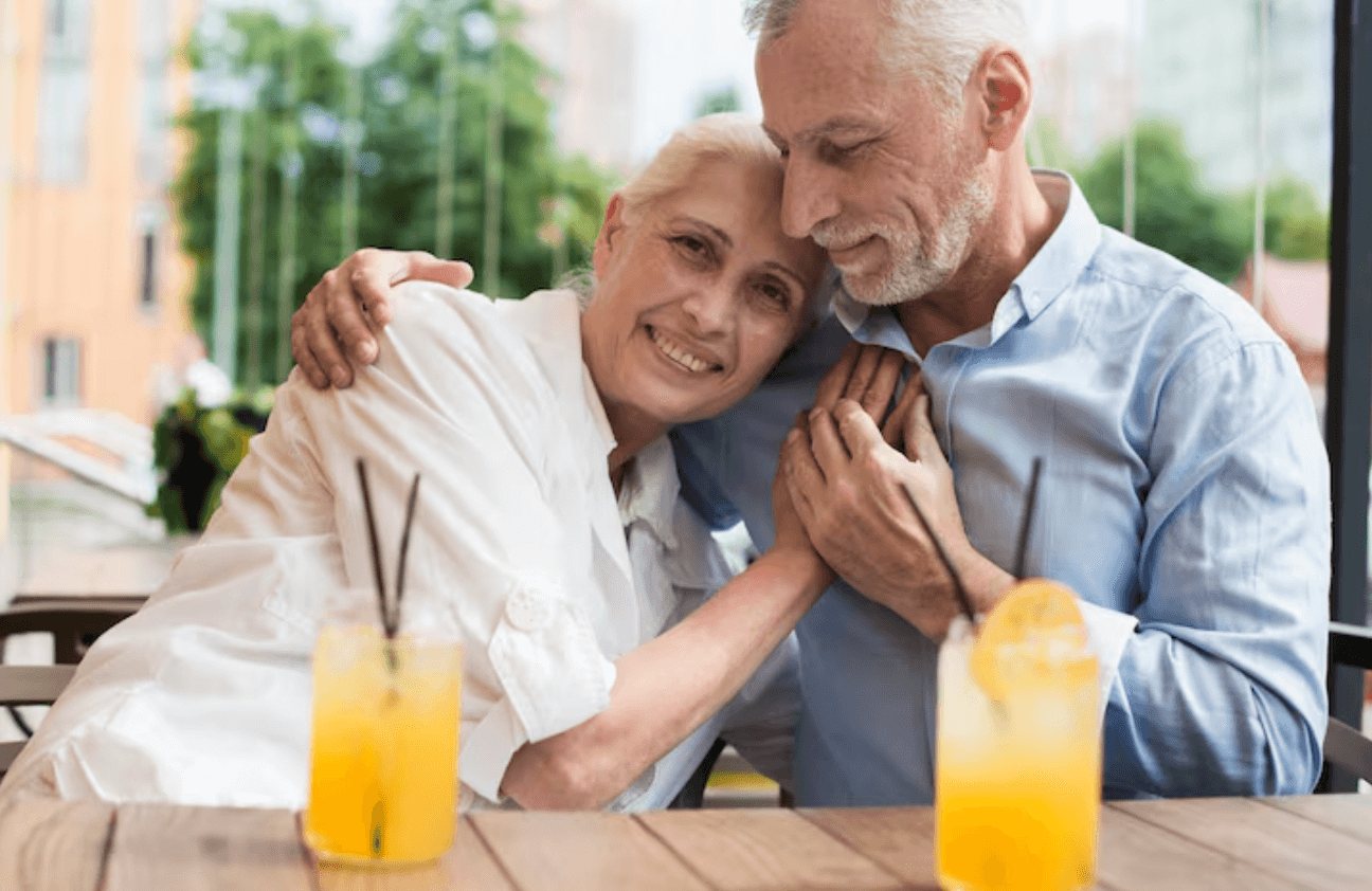 Mature couple enjoying a relaxed date over drinks